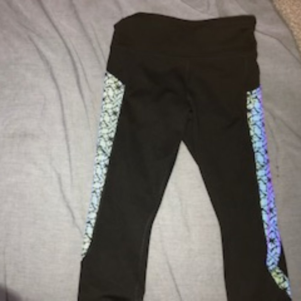 Black pants with Holographic pockets on sides
